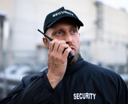 Security Guard Talking On Radio