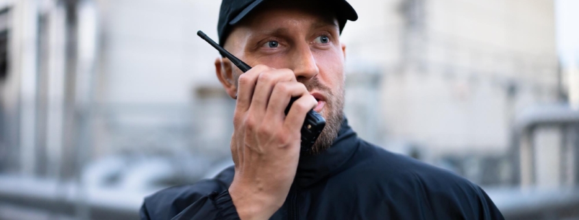 Security Guard Talking On Radio