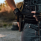 Close-up image of a heavily armed man