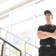 Male security guard with portable radio transmitter indoors